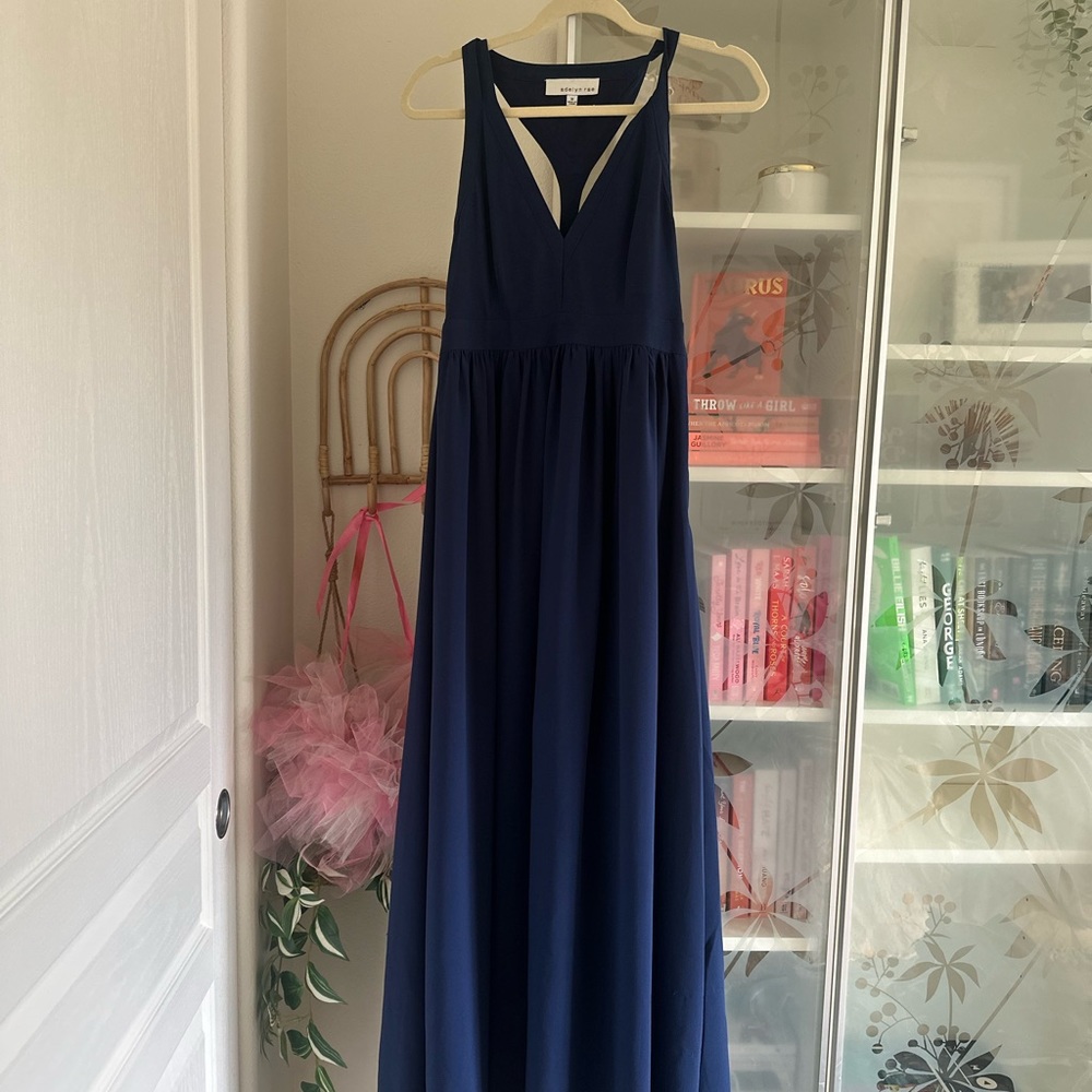 Adelyn Rae navy blue long sleeveless dress in a medium